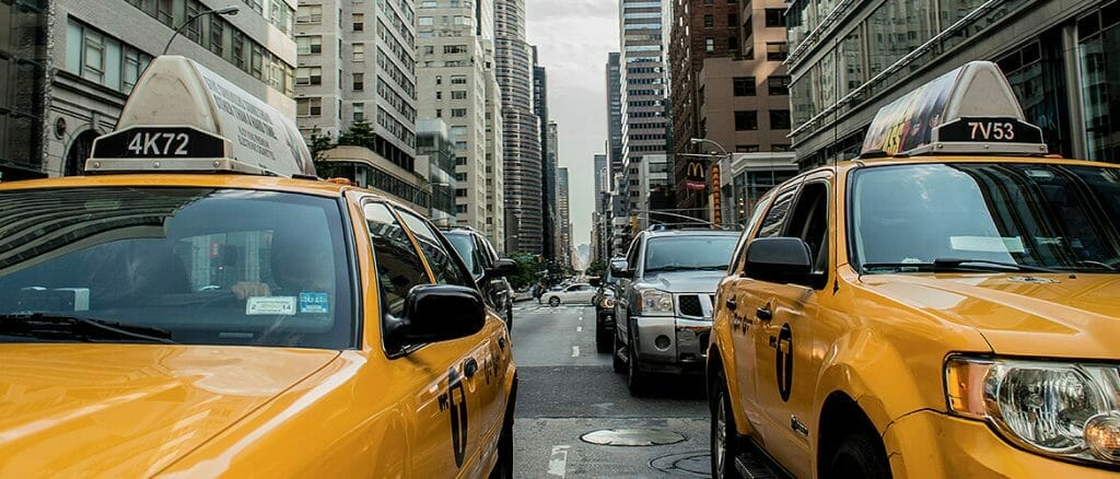 taxis on city street